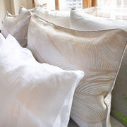 Close-up of Saturna Jacquard shams showing wave pattern detail – Cotton Linen blend by St. Genève